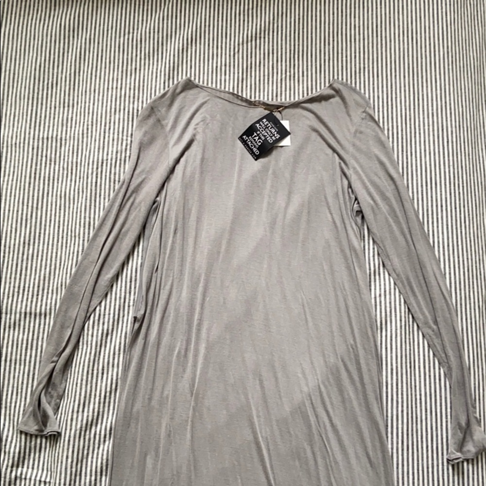The Row long-sleeved high-slit shirt